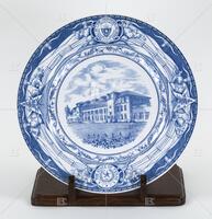 Photograph of a blue and white plate with a picture of the Engineering Building. .