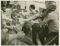 Photograph of confrontation near the Texas Union restaurant known as the Chuck Wagon.