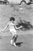 Photograph of Girls Intramural Football Team – Practicing punting