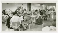 Photograph of students eating at the Texas Union Chuck wagon