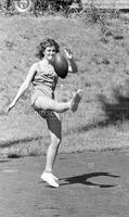 Photograph of Girls Intramural Football Team – Practicing punting