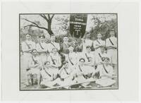 Photograph of a Texas sports team holding a TIAA Championship banner