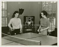 Photograph of two women students playing table tennis, undated
