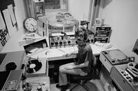 Photograph of a KUT Radio DJ