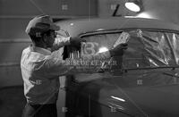 A student in the auto body repair and painting shop