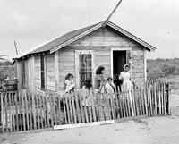 Father and mother with five of their eight children