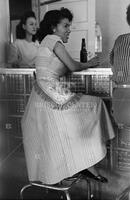 A waitress in a beer parlor. San Angelo, Texas.