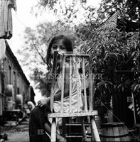 Child who lives in a slum corral.