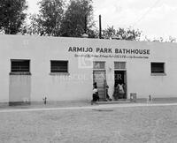 Bathhouse adjacent to swimming pool.