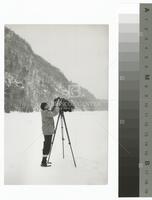 Photograph of Eliot Porter with cameras in the Adirondack Mountains