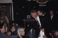 Photograph of Bill Clinton greeting people at Scholz Garten, 1993