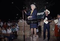 Photograph of Ann Richards speaking at a campaign event for Jim Hightower, 1990