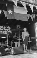 Photograph of Ann Richards speaking at Scholz Garten, July 2, 1992