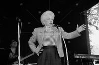 Photograph of Ann Richards speaking at Scholz Garten, July 2, 1992