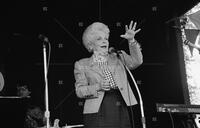 Photograph of Ann Richards speaking at Scholz Garten, July 2, 1992