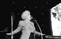 Photograph of Ann Richards speaking at Scholz Garten, July 2, 1992