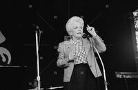 Photograph of Ann Richards speaking at Scholz Garten, July 2, 1992