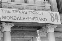 Photograph of a banner for candidates Walter Mondale and Geraldine Ferraro during a campaign event, August 1, 1984