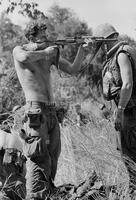 Photograph of a U.S. Marine holding a rifle, 1967