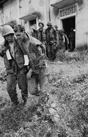 Photograph of U.S. Marines leaving a church in Vietnam, 1967