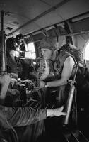 Photograph of U.S. Marines on a helicopter, 1967