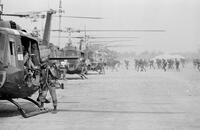 Photograph of soldiers getting on helicopters from the 175th Assault Helicopter Company, 1967