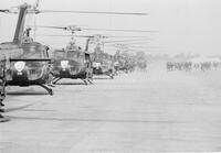 Photograph of soldiers getting on helicopters from the 175th Assault Helicopter Company, 1967