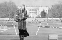 Photograph of a protester in front of the White House during the Moratorium to End the War in Vietnam, November 15, 1969