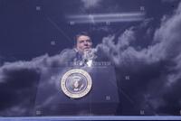 Photograph of Ronald Reagan during a press briefing