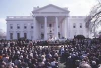 Photograph of Anwar Sadat, Jimmy Carter, and Menachem Begin in front of the White House signing the Israel-Egypt peace treaty, March 26, 1979