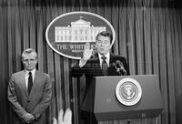 Photograph of Ronald Reagan during a press briefing, 1987