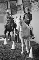 Photograph of Nancy Reagan riding a horse, 1987