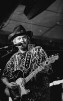 Photograph of Merle Haggard performing, June 24, 1993