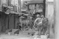 Photograph of conflict in a street