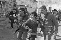 Photograph of a Palestinian man seized by Israeli Forces