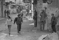 Photograph of people on a street