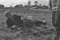 Photograph of a person in a field