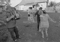 Photograph of people dancing and playing music