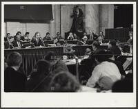 Black and white photograph of the front of the courtroom during the Iran-Contra trials, 1987
