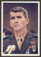 Color close-up photograph of Lt. Col. Oliver North during the Iran-Contra trials, July 1987