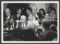 Black and white photograph of Jack Brooks thinking, cigar in hand, during the Iran-Contra trials, July 14, 1987