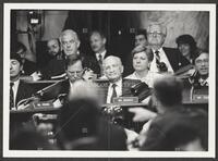 Black and white photograph of Jack Brooks gesturing with his cigar during the Iran-Contra trials, July 14, 1987