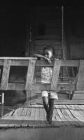 Child on porch in Alabama