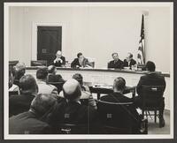Photograph of Jack Brooks and Congressional members during ADP hearings, July 18, 1967