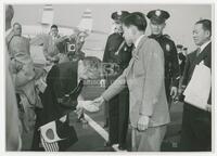 Photograph of Man Shaking Hand of Crown Prince