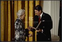 Eudora Welty accepting presidential award from Reagan