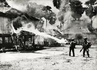 South Vietnamese soldiers burning Viet Cong village