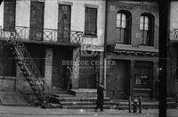 Man in doorway, New York, ca. 1935-1936