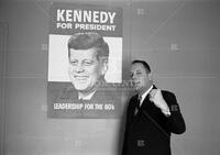 Maury Maverick Jr. with JFK poster