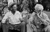J. Frank Dobie (right) and Hart Stillwell at Joe Small's barbecue